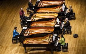 Six Pianos 